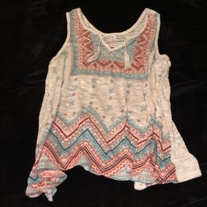 White tank top with designs on front